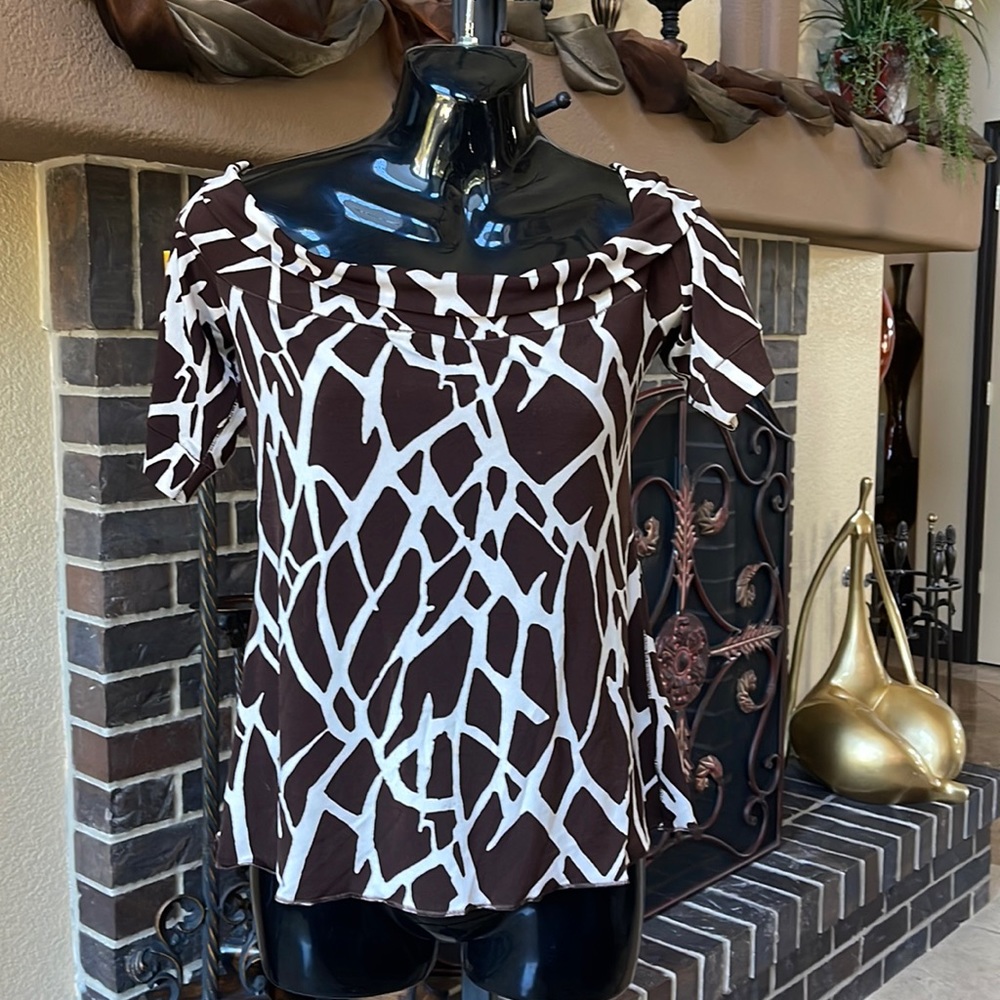 Macy’s off the should animal print fitted top.